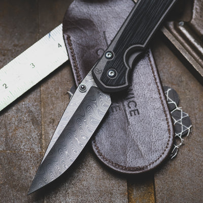 Chris Reeve Knives Large Sebenza 31 w/ Black Micarta Inlay & Boomerang Damascus