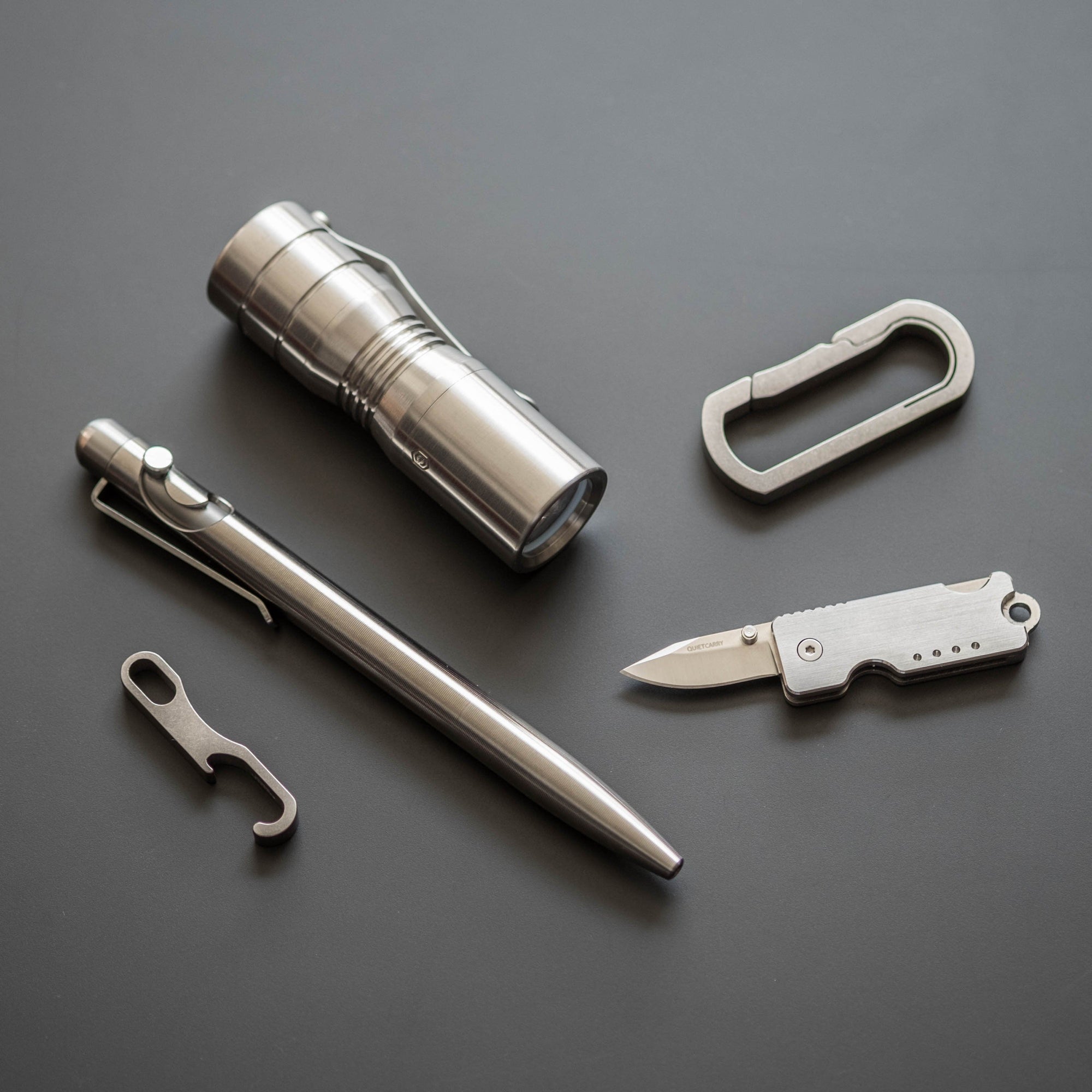 https://urbanedcsupply.com/cdn/shop/products/keychains-multi-tools-handgrey-bauhaus-titanium-micro-bottle-openers-10_2000x.jpg?v=1531520349