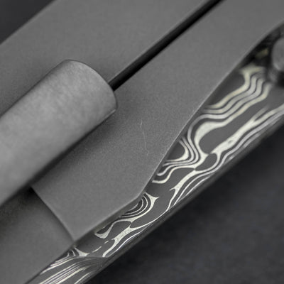 Knife - Pre-Owned: Kody Eutsler Equalizer - Damascus Chisel Grind, Zirconium / Carbon Fiber  (Custom)